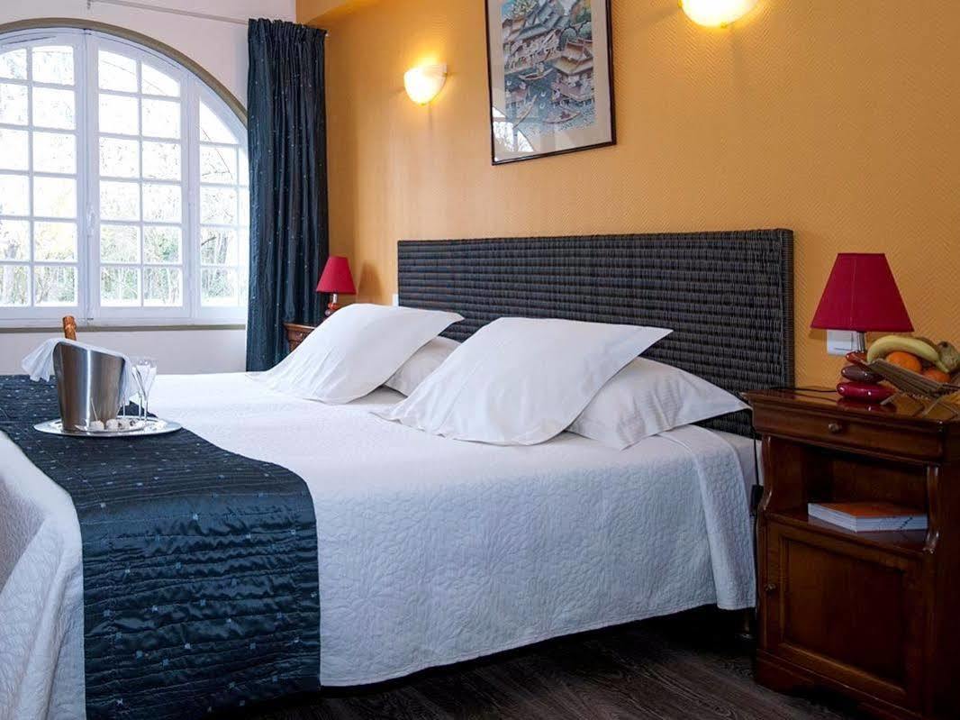 Le Coq Hardi Hotel