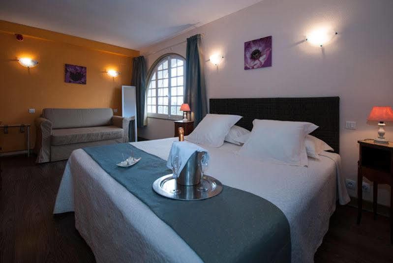 Le Coq Hardi Hotel